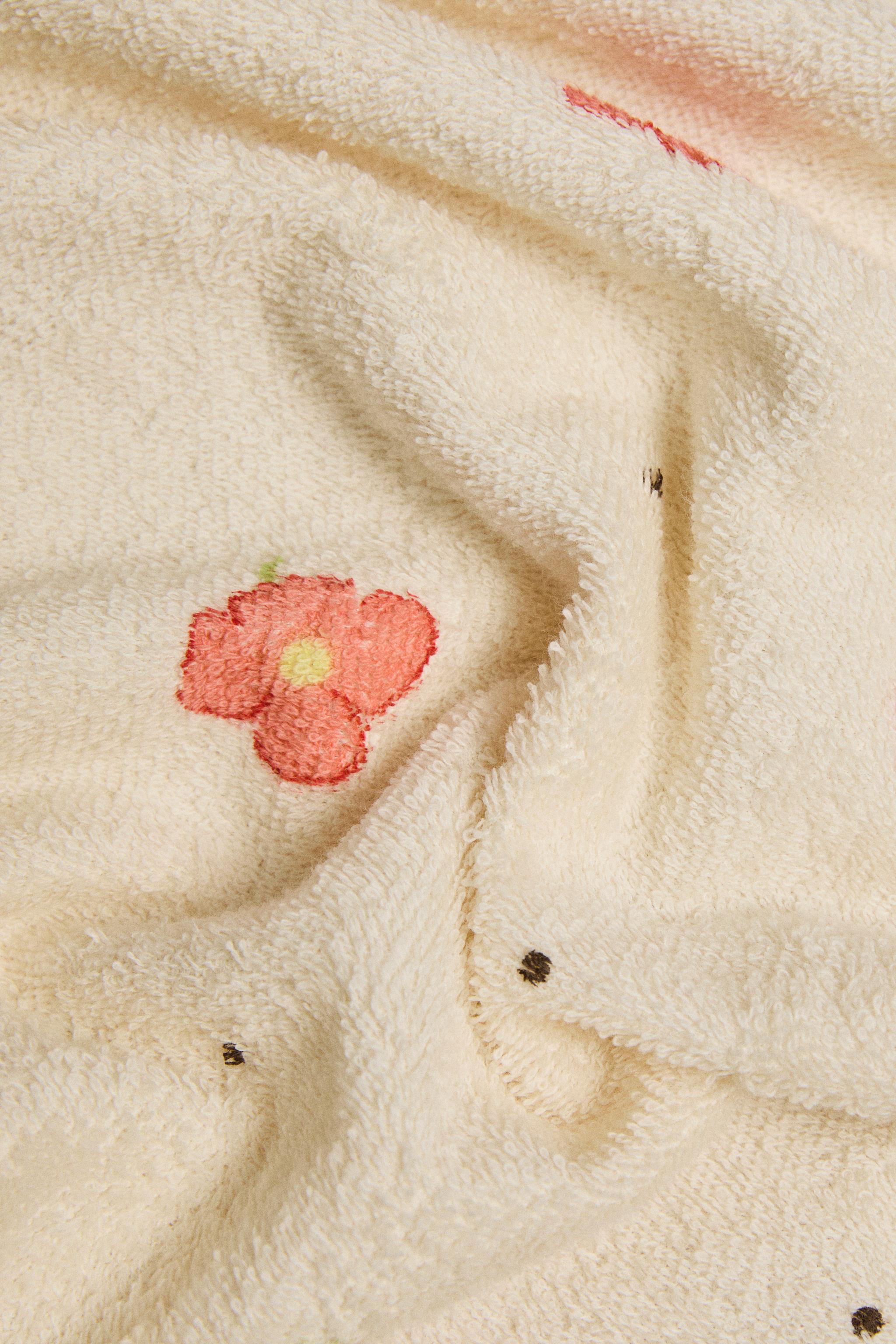SERVIETTE DE PLAGE FLEURIE